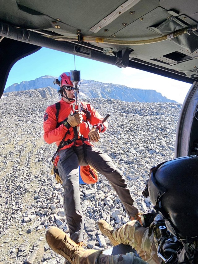 The Wyoming Army National Guard worked with Big Horn County Search and Rescue members to medevac an injured 18-year-old man stranded at 12,200 feet on Cloud Peak July 26, 2023. The man was hoisted to a Wyoming Guard Black Hawk UH-60 helicopter.