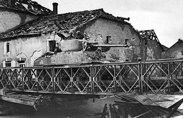 A tank from Able Company, 761st Tank Battalion, crosses the Seille River in France, Nov. 9, 1944, the unit&#39;s second of 183 days in combat.
