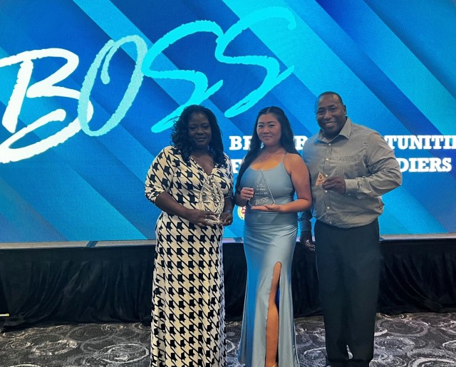 Neicey Davis, DFMWR BOSS advisor, and Sgt. Jasmine Tcha, BOSS president, pose with Command Sgt. Maj. Calvin Hall, U.S. Army Garrison-Fort Cavazos command sergeant major, at the 2023 Boss awards ceremony in July. The Fort Cavazos BOSS program...