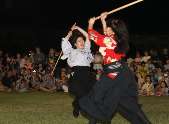 A Japanese &#34;kendo&#34; team, which translates to &#34;the way of the sword,&#34; demonstrates its skills during the Bon Odori festival at Camp Zama, Japan, Aug. 5, 2023. About 20,000 people attended this year&#39;s event, which honors the departed spirits of one’s ancestors. The traditional Japanese festival has been celebrated at Camp Zama since 1959.