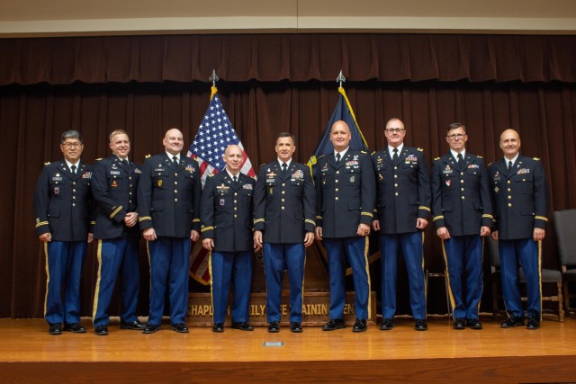 The six new family life chaplains pose for a photo alongside their cadre following their graduation ceremony July 28 at the Chaplain Family Life Training Center at Fort Cavazos. (U.S. Army photo by Samantha Harms, Fort Cavazos Public Affairs)