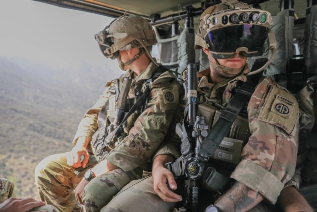 Sgt. Jared Row and Spc. Jordan Deblasi, assigned to 82nd Airborne 3rd Brigade Combat Team, observe area of operations through the Integrated Visual Augmentation System (IVAS).