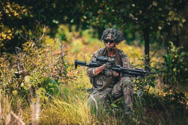 A U.S. Army Paratrooper from the 2nd Brigade Combat Team, 82nd Airborne Division conducts squad-level training at Fort Liberty, North Carolina. 