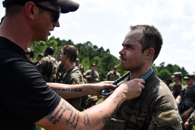 U.S. Army Soldiers from across the nation receive their blue Infantry Shoulder Cords July 26, 2023, in recognition of their successful completion of the 11B Infantry Transition Course, taught by cadre assigned to the 183rd Regiment, Regional...