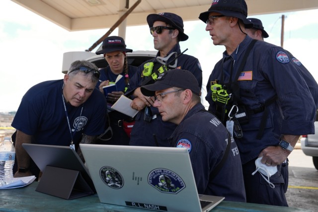 Federal Emergency Management Agency search and rescue teams from Washington and Nevada work with federal and private sector partners to continue wildfire response efforts, Aug. 14, 2023, at Lahaina, Hawaii.