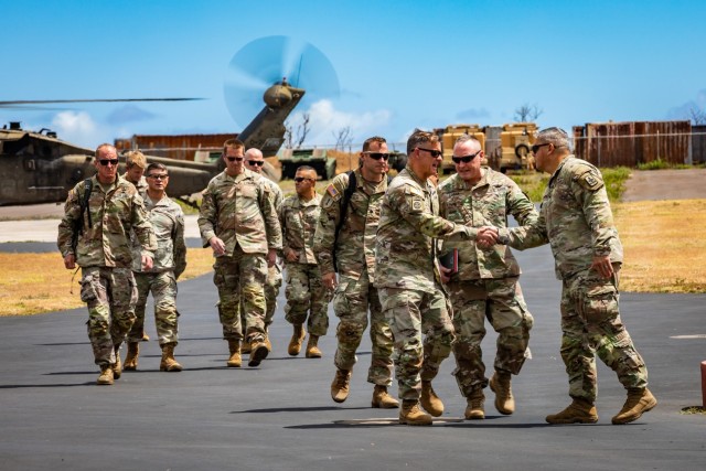 Army Gen. Charles A. Fynn, commanding general of the U.S. Army Pacific, greets the command element of the Combined Joint Task Force 50 at the Hawaii Army National Guard Puunene Armory, Maui, Hawaii, Aug. 15, 2023.
