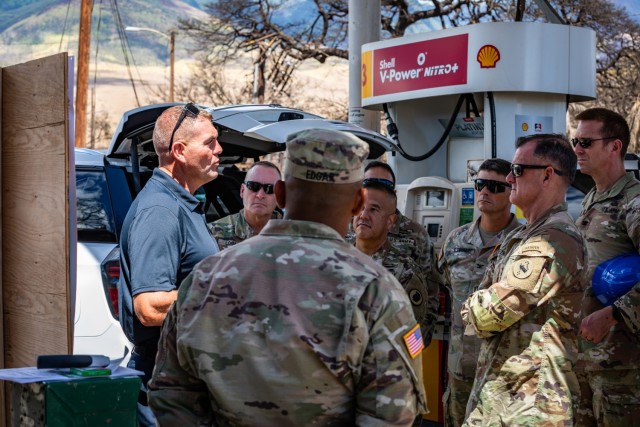 Gen. Charles A. Fynn, commanding general of the U.S. Army Pacific, alongside the command element of the Joint Task Force 5-0, meets with search, rescue and recovery personnel in Lahaina, Maui, Aug. 15, 2023.