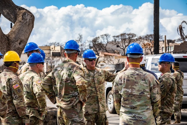 Army Gen. Charles A. Fynn, commanding general of U.S. Army Pacific, alongside the command element of the Combined Joint Task Force 50 meets with search, rescue and recovery personnel following wildfires in Lahaina, Maui, Hawaii, Aug. 15, 2023.