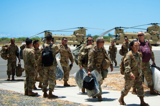 Hawaii National Guardsmen arrive at Kalaeloa Airport in Hawaii after supporting the town of Lahaina, which was devastated by the wildfires on Maui, Aug. 18, 2023.