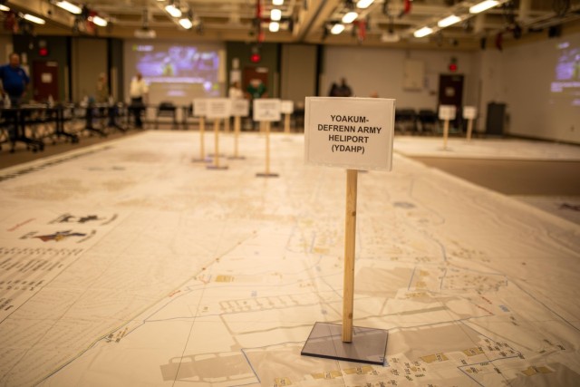 A large-scale map of the installation with various points highlighted, such as the Yoakum-Defrenn Army Heliport, plays a role in the Installation Deployment Support Plan Rehearsal of Concept Drill.  (U.S. Army photo by Samantha Harms, Fort Cavazos Public Affairs) 