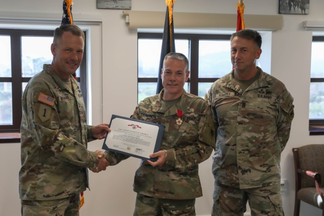 U.S. Army National Guard Brig. Gen. Patrick Thibodeau, former deputy commanding general for U.S. Army Southern European Task Force, Africa (SETAF-AF), receives the Legion of Merit  from Maj. Gen. Todd R. Wasmund, SETAF-AF commanding general, , at...