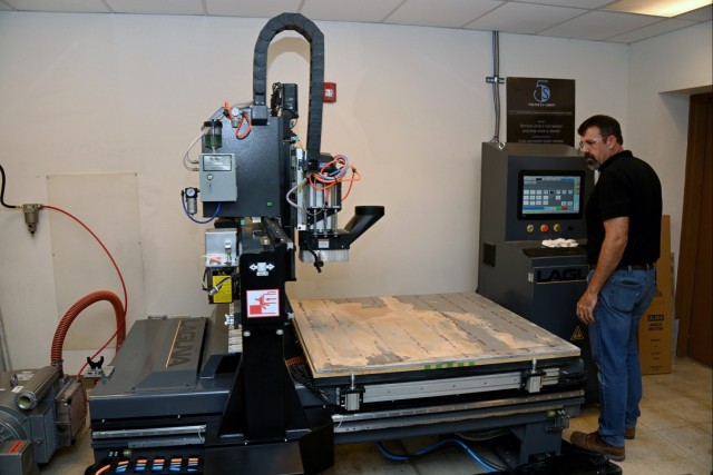 U.S. Army Yuma Proving Ground Electro Optical Maintenance Lab Supervisor Drew Trujillo uses the lab’s recently-acquired router table. lab is responsible for the maintenance, repair, and even design of a variety of equipment, from cameras and...