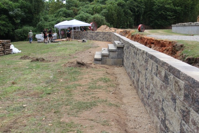 The retaining wall built by Warrant Officer Candidates and Better Opportunity for Single Soldiers volunteers at the Holman House in Ozark, Ala. on August 26, 2023.