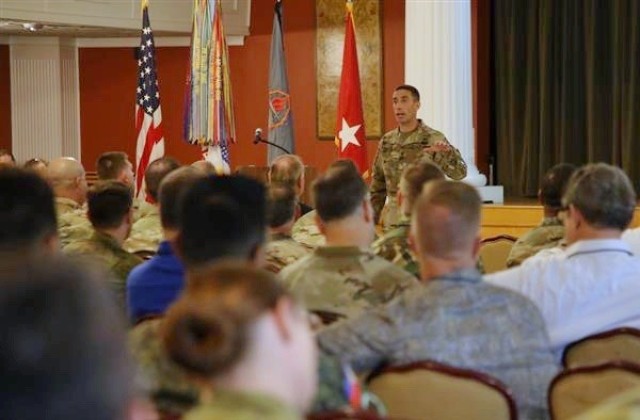 Maj. Gen. Paul Stanton addresses the audience during Cyber Quest 23. 