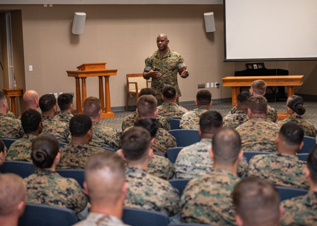 Marine Sgt. Maj. Wesley Turner 2nd Marine Logistics Group sergeant major, speaks to permanent party Marines here at an open discussion Wednesday in Specker Chapel. 