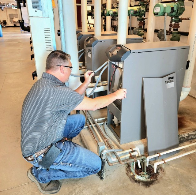 Kevin Carse inspects a boiler located at the Army Reserve Center at Fort Benjamin Harrison, Indianapolis, Indiana. Carse, Electrical Engineering Technician, performs duties supporting BASEOPS out of the Louisville District’s Indianapolis...
