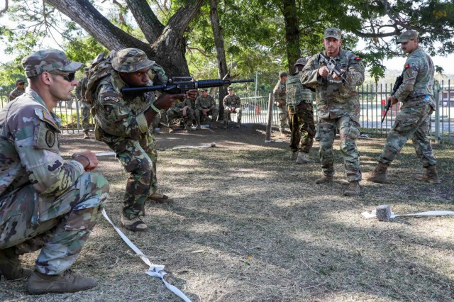 Soldiers with the Wisconsin Army National Guard’s 1st Squadron, 105th Cavalry Regiment, trained with soldiers of the 1st Royal Pacific Infantry Regiment, Papua New Guinea Defence Force, on room-clearing techniques as part of Exercise Tamiok...