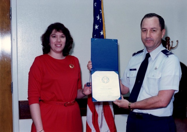 Gloria Miller received a pin for 10 years of U.S. Department of Defense civilian service in 1994, while serving in San Antonio, Texas. 