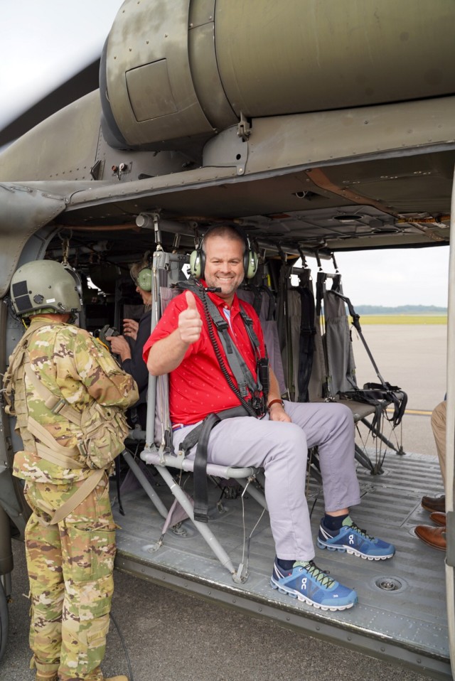 Daniel London, executive director of the Lincoln Trail Area Development District, is about to fly in a Black Hawk helicopter on Sept. 7, 2023 for a Fort Knox range overflight. Fifteen ADD leaders participated in the overflight to get familiarized with the scope and types of training that occurs at the central Kentucky Army post.