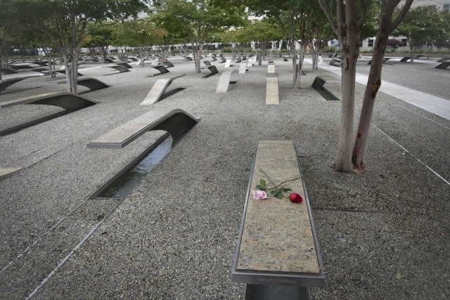 Roses are placed on a bench at the National 9/11 Pentagon Memorial on the 19th anniversary of the Sept. 11th terrorist attacks, Arlington, Va., Sept. 11, 2020.
