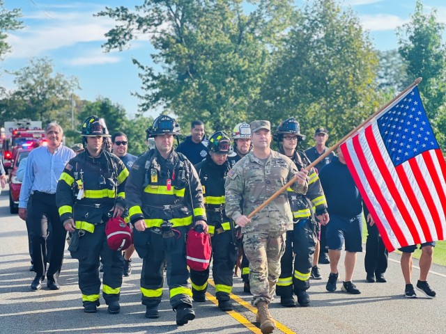 PICATINNY ARSENAL, N.J. - Picatinny Arsenal’s Commanding General, Brig. Gen. John T. Reim, led the final hour of the Picatinny Arsenal Fire Department&#39;s 24-Hour Moving Flag Tribute on Sep. 12.  ...