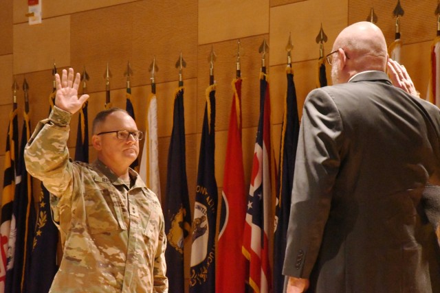 Major General Edmond ‘Miles’ Brown administers the oath during DEVCOM Analysis Center’s (DAC) Assumption of Responsibility ceremony of September 6, where Mr. Larry Larimer was officially sworn in as t