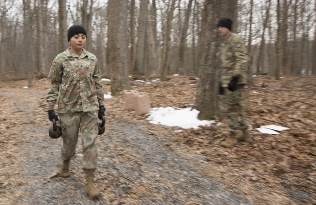Then-Sgt. Kaileen Santos-Lopez carries kettle bells at Camp Fretterd, Maryland,  on March 27, 2018 during the 53rd Signal Battalion’s Best Warrior Competition.

Santos, now a staff sergeant will earn an officer&#39;s commission while studying health systems management at the University of North Carolina-Charlotte. 