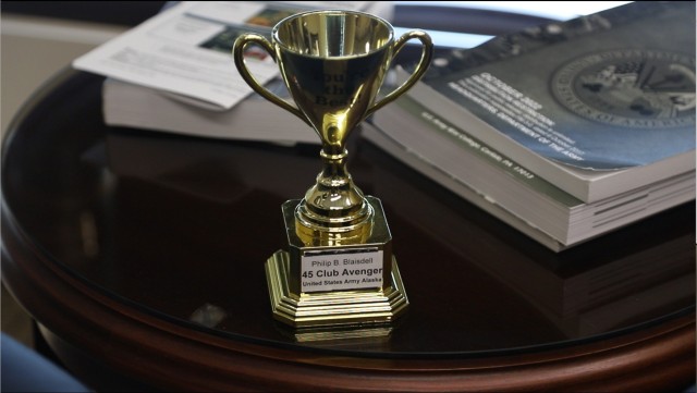 Command Sgt. Maj. Philip Blaisdell&#39;s most prized possession, his &#34;45 Club Avenger&#34; trophy given to him by a Soldier. 