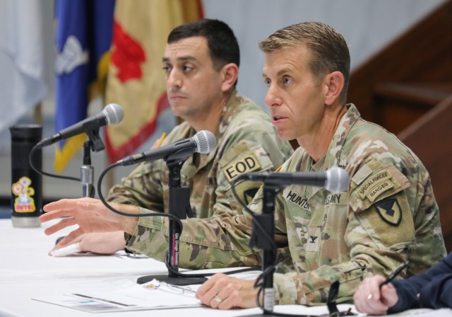 Col. Marcus Hunter, right, commander of U.S. Army Garrison Japan, answers a question during a housing town hall inside Kizuna Hall at Camp Zama, Japan, Sept. 14, 2023. The forum discussed a range of issues from housing assignments to renovations and a potential policy change to allow pets inside the Camp Zama housing towers. 