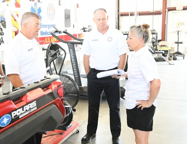 Fire Chief Gerald Ball of the Yuma Fire Department (left), discusses with Lake Martinez Fire Department Fire Chief Jodi Little (right) the resources his agency will be able to provide now that an official Mutual Aid Agreement is now in place...