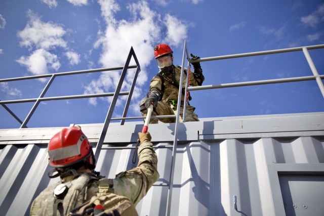 Nevada Army National Guard Soldiers in the search and extraction element scavenge a simulated impacted area for injured victims Sept. 13, 2023. These Guardsmen train to prepare for chemical, biological, radiological, nuclear and explosive attacks...