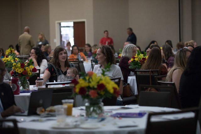Military spouses connect with each other during an ice-breaking exercise at MilSpouseFest Sept. 14 at the Courtyard by Marriott Killeen. (U.S. Army photo by Blair Dupre, Fort Cavazos Public Affairs)