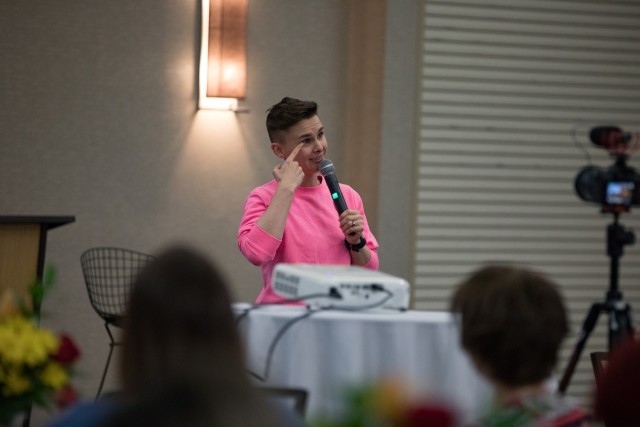 Ashley Gutermuth, comedian and MC for the event, performs for the attendees Sept. 14 at MilSpouseFest. (U.S. Army photo by Blair Dupre, Fort Cavazos Public Affairs)