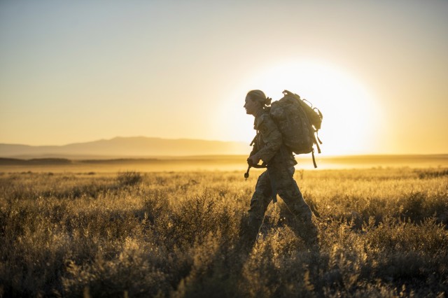Idaho Army National Guard Staff Sgt. Lauren Cox completes an 11-mile ruck with a 40-pound weight in a pack during the Army National Guard Best Warrior Competition near Boise, Idaho, Sept. 16, 2023. During the competition, 15 Idaho National Guardsmen participated in intensified tests that challenged candidates physically and mentally while evaluating the ability to shoot, move, communicate and survive.