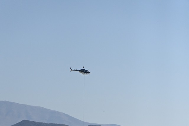 A helicopter delivers a sample of the asteroid Bennu to a clean room at U.S. Army Dugway Proving Ground on September 24, 2023. The sample was collected by NASA&#39;s OSIRIS-REx spacecraft in 2020 and is the first such sample return collected by a...