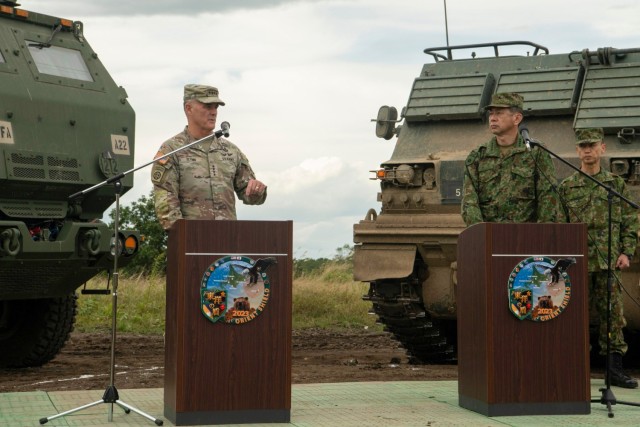 Gen. Charles A. Flynn, left, commander of U.S. Army Pacific, and Gen. Yasunori Morishita, chief of staff of the Japan Ground Self-Defense Force, address members of the press following a High Mobility Artillery Rocket System demonstration during Orient Shield 23 at Yausubetsu Training Area, Japan, Sept. 20, 2023.