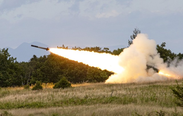 A surface-to-surface missile from a High Mobility Artillery Rocket System clears the tree line as it heads to its target during Orient Shield at Yausubetsu Training Area, Hokkaido, Japan, Sept. 20, 2023. Japanese and American teams fired missiles to designated targets while adjusting coordinates and elevation. 