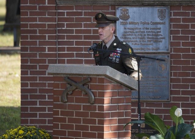 U.S. Army Military Police School Regimental Command Sgt. Maj. William Shoaf speaks during a memorial tribute ceremony Sept. 18 at Memorial Grove.