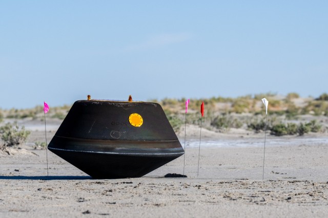 The sample return capsule from NASA’s OSIRIS-REx mission is seen shortly after touching down in the desert, Sunday, Sept. 24, 2023, at the Department of Defense's Utah Test and Training Range. The sample was collected from the asteroid Bennu in...