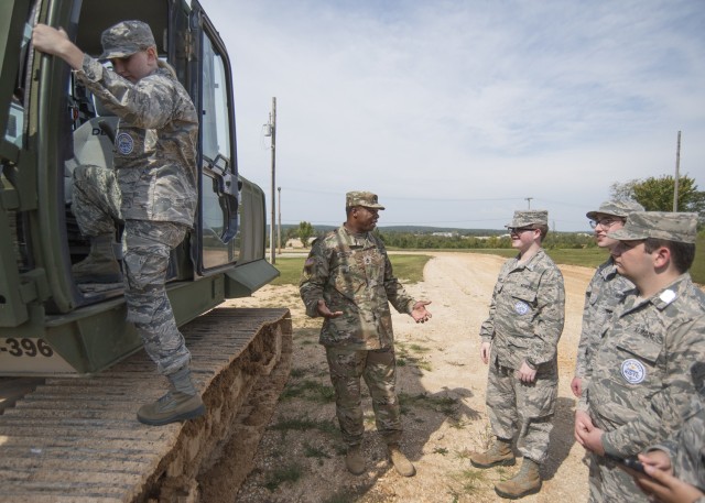 Sgt. 1st Class Marion Chisolm, an instructor with Company A, 554th Engineer Battalion, speaks with Junior ROTC cadets from St. Clair High School in St. Clair, Missouri, Saturday at Training Area 244. The cadets – along with three future Soldiers...