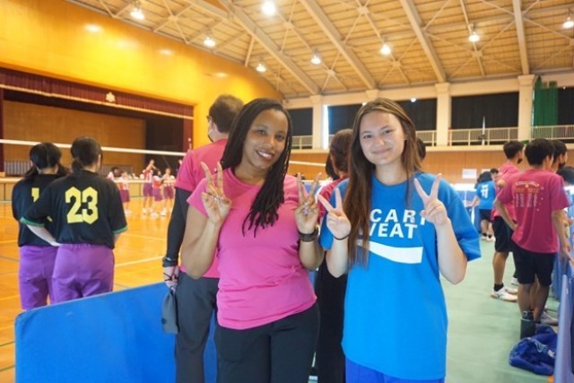 Carr and her English teacher at a sporting event