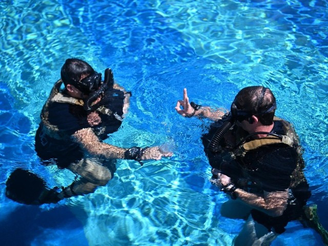 Competitors in the 2023 U.S. Army Special Operations Command (USASOC) Best Dive Team Competition validate their equipment and undergo pre-competition training