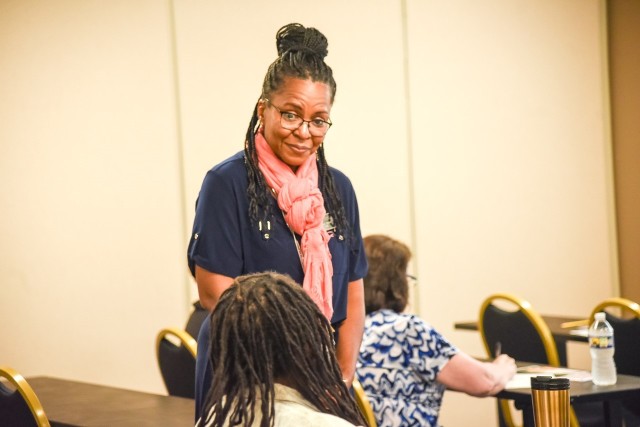 Ivan Taylor, military life family counselor, answers a question during her workshop “Let’s Talk Stress: Don’t Lose It, Handle It!” at the Wellness Summit on Sept. 20.