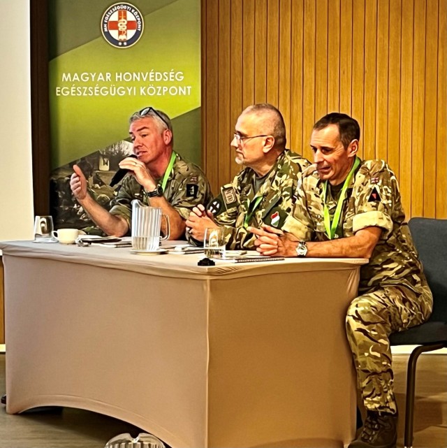 Col. (Dr.) Ian Gurney, British Royal Army Medical Corps, Col. (Dr.) Zoltan Toth, Hungarian Army and Lt. Col. David Jenkins, British Royal Army Medical Corps participate in a panel discussion on the evolution of pre-hospital care during the 30th Annual MMME conference held in Budapest, Hungary Sept. 26-28.