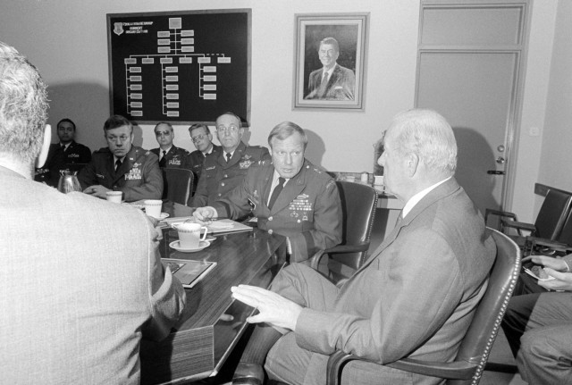 After leaving 1st SOCOM in August 1984, Maj. Gen. Joseph C. Lutz served as Chief of the Joint United States Military Aid Group to Greece. Here his pictured (second from right) briefing U.S. Secretary of State George Schultz (far right) at Hellenikon Air Base, Greece.
