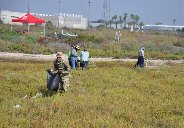 Corps, Newport Beach partner during cleanup event at salt marsh