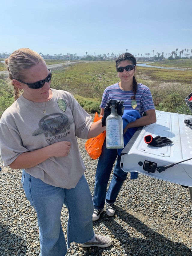 Corps, Newport Beach partner during cleanup event at salt marsh