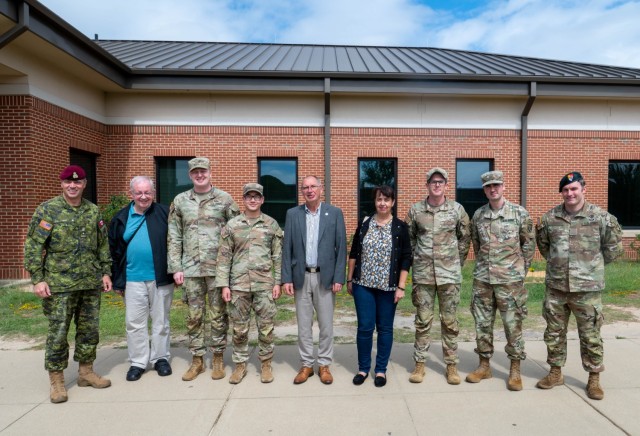 Mayor of Saint Avold, France, Rene’ Stiener, his Deputy Mayor Raymande Schweitzer, and Historian Pasqual Flaus pose for a photo with French students from the Special Warfare Center School Sept. 28, 2023, at Fort Liberty, North Carlina. 

