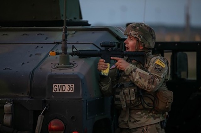 U.S. Army Spc. Jason Clark, military policeman, Company A, 49th Missile Defense Battalion, protects the Missile Defense Complex from mock enemies during Exercise Guardian Strike at Fort Greely, Alaska, Aug. 1, 2023. Guardian Strike evaluated...