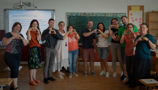 U.S. Army Maj. Sean Q. Spooner, a New York National Guardsman assigned to the 10th Mountain Division, third from left, poses for a photo with teachers from the Targusor School during a volunteering event in Targusor, Romania, Sept. 6, 2023. The...